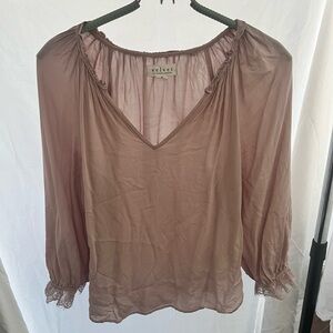 Women’s medium top lace at sleeves.